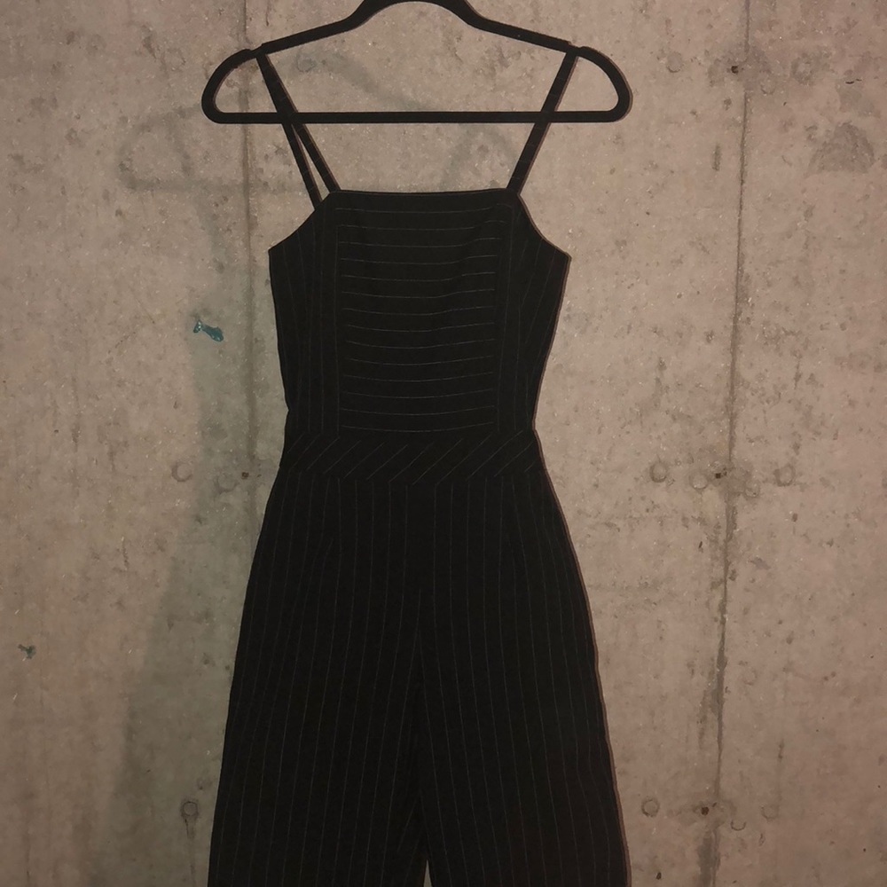 Pin striped jumpsuit.